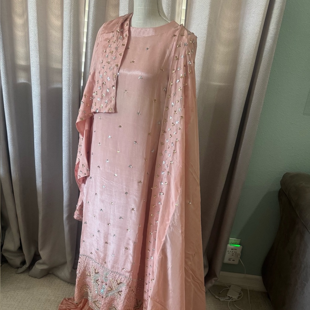 Elegant Peach color Embellished Saree